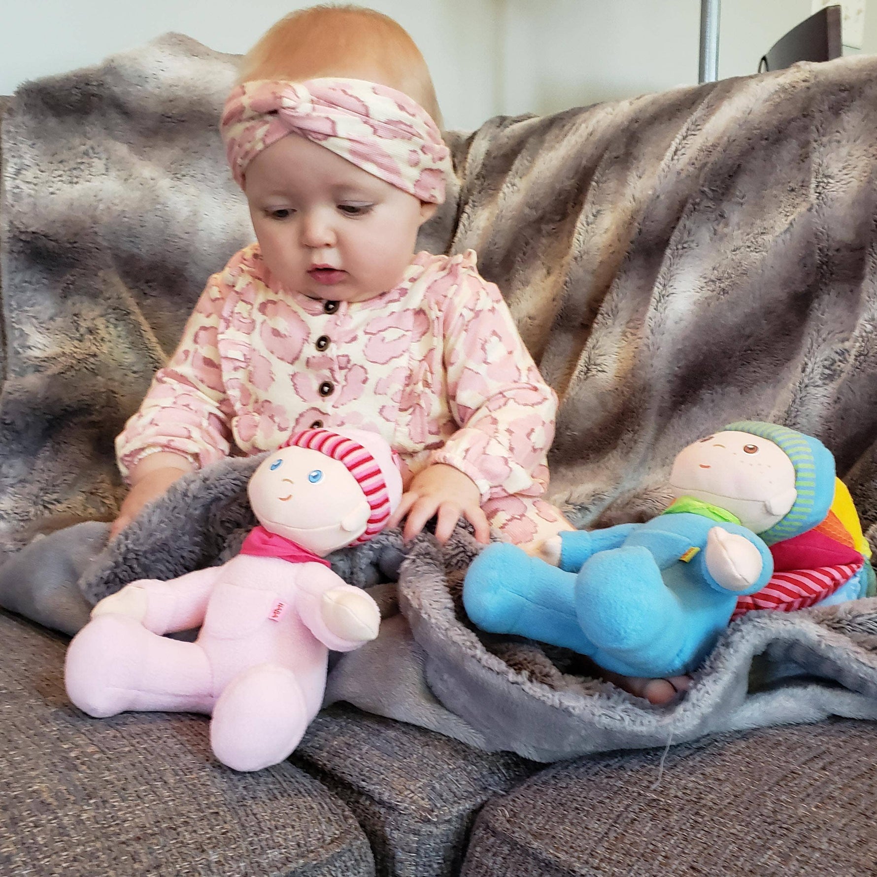 My First Snug Up Luis baby doll close-up by HABA USA