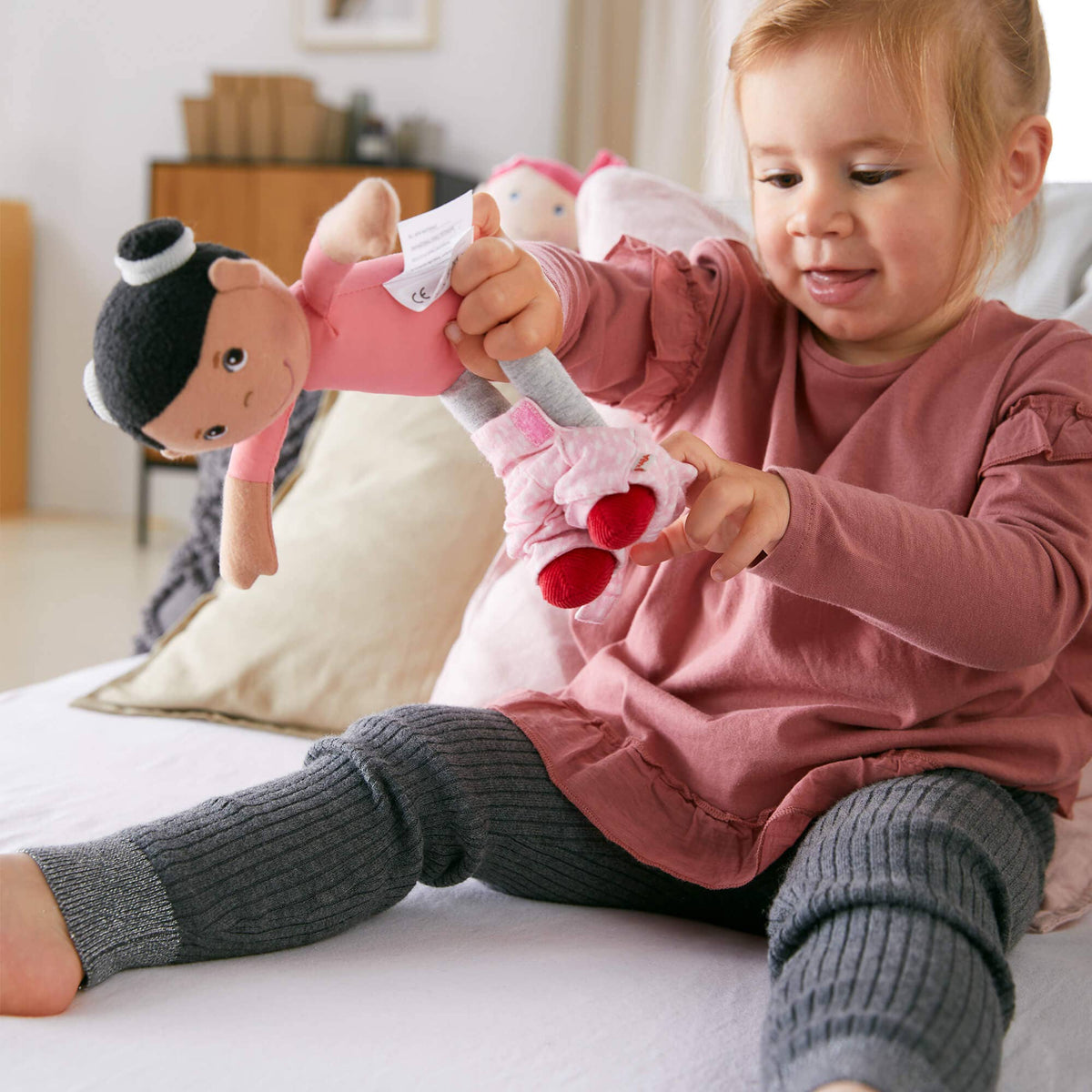 Snug Up Rumbi soft doll full view by HABA USA