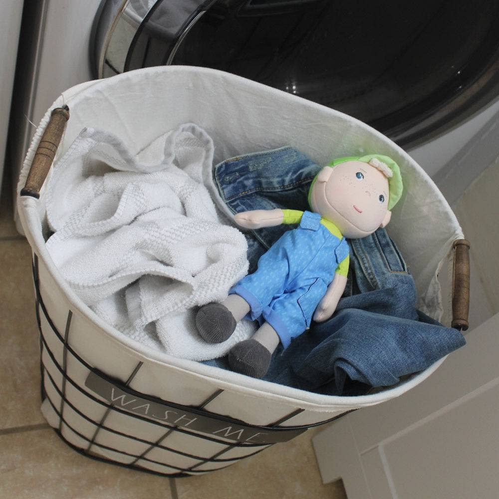 Snug Up Till soft doll sitting by HABA USA