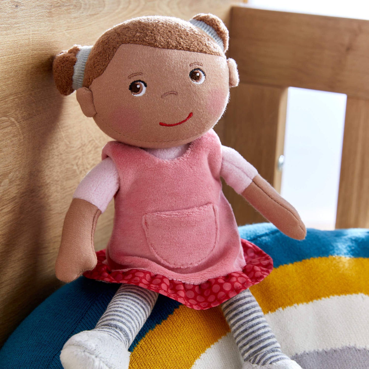 Snug Up Camilla soft doll back view by HABA USA