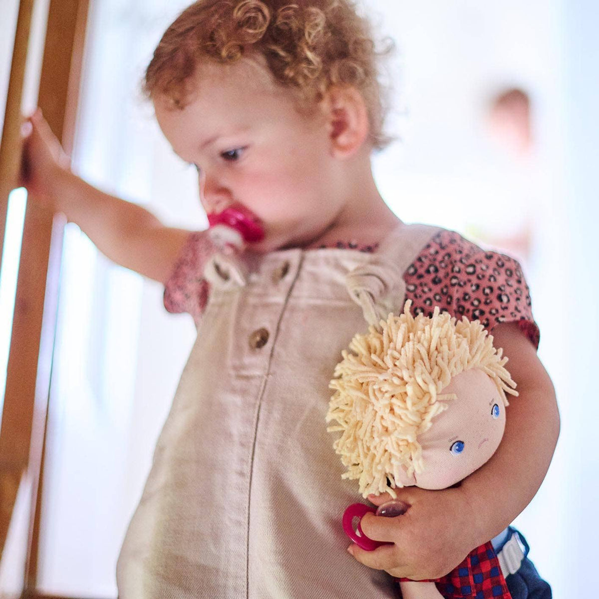 Nick soft doll back view by HABA USA