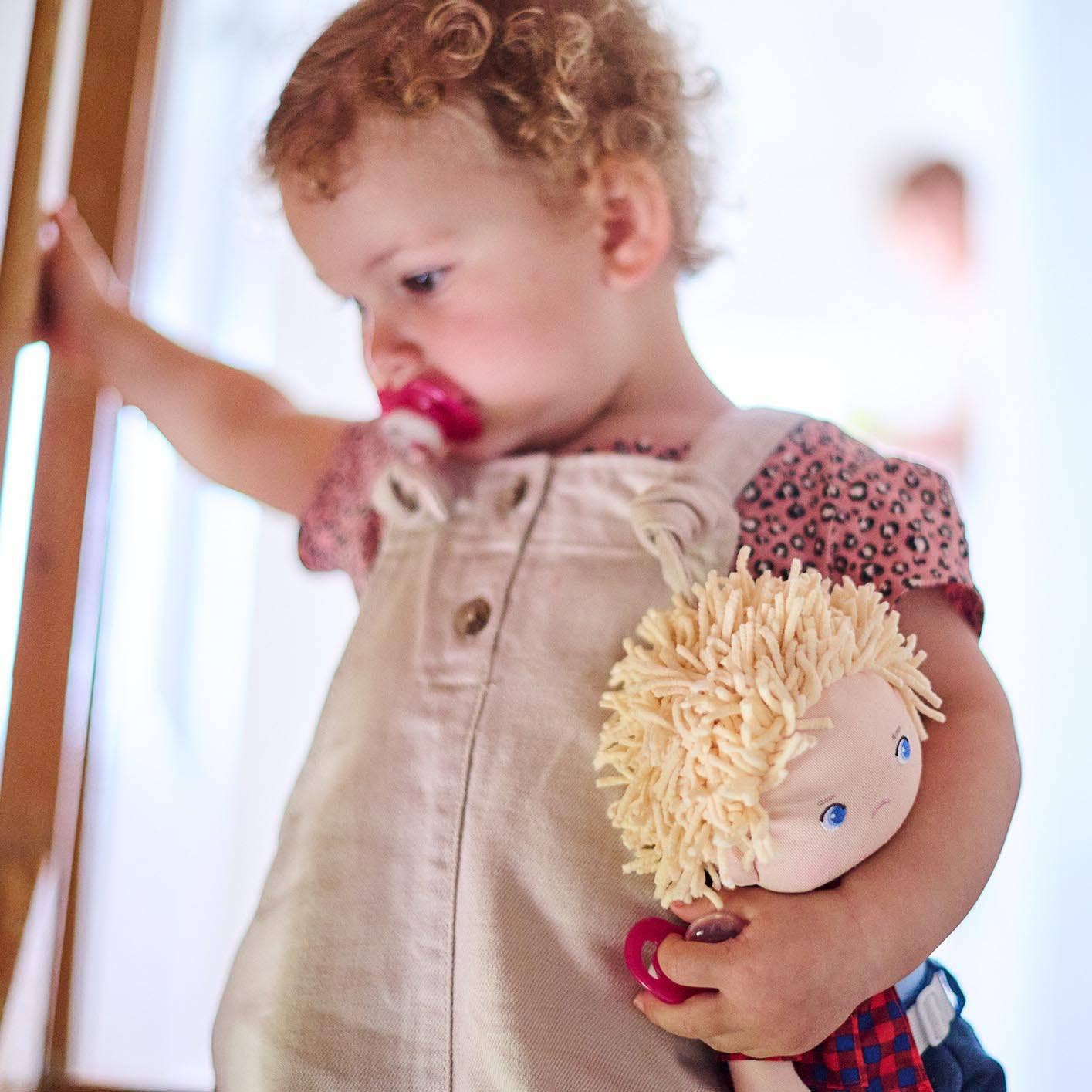 Nick soft doll back view by HABA USA