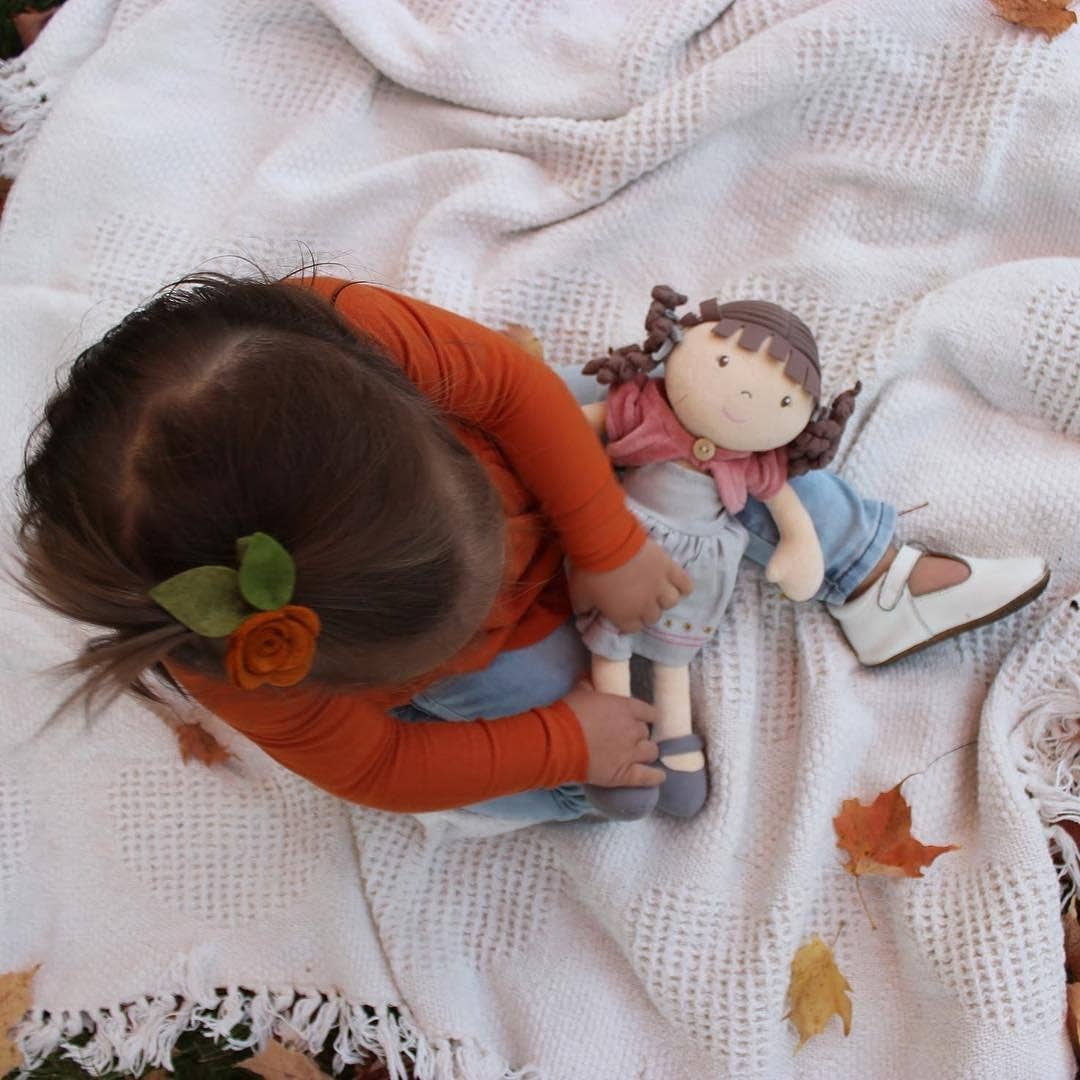 Rose organic doll standing by Tikiri Toys