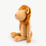 Plush lion toy on a white background
