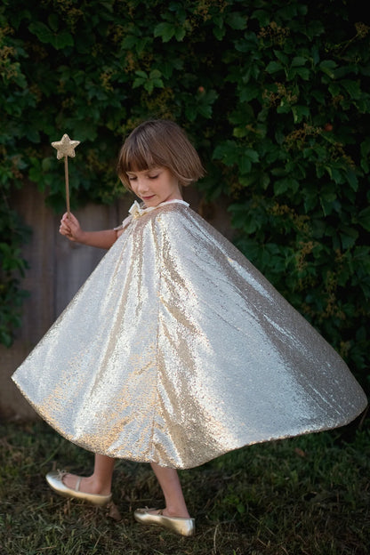 Gracious gold sequins cape size 5-6 on model by Great Pretenders