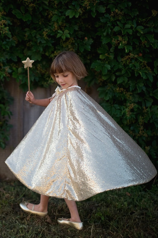 Gracious gold sequins cape size 5-6 on model by Great Pretenders