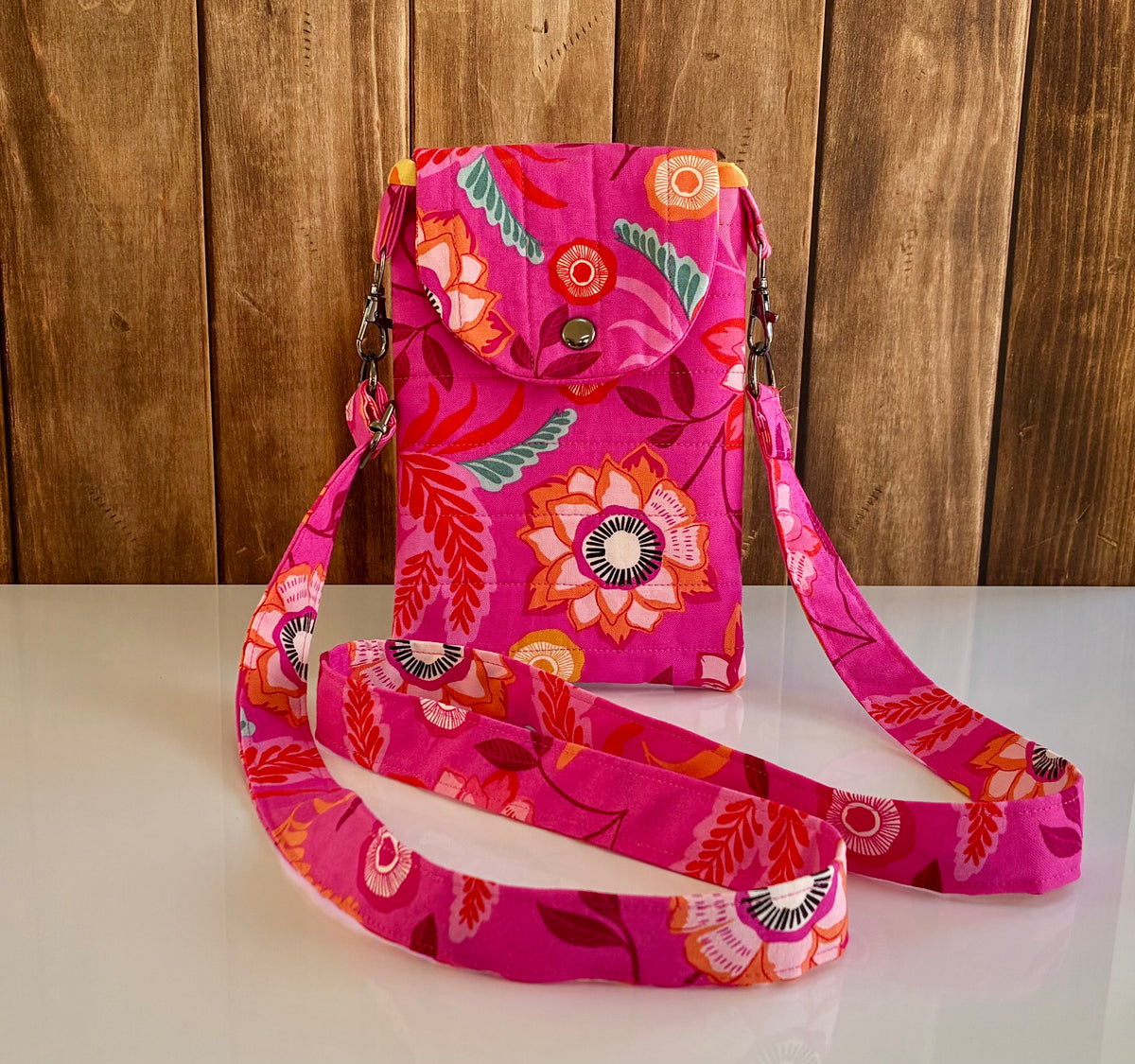 Handmade bright pink quilted crossbody bag open