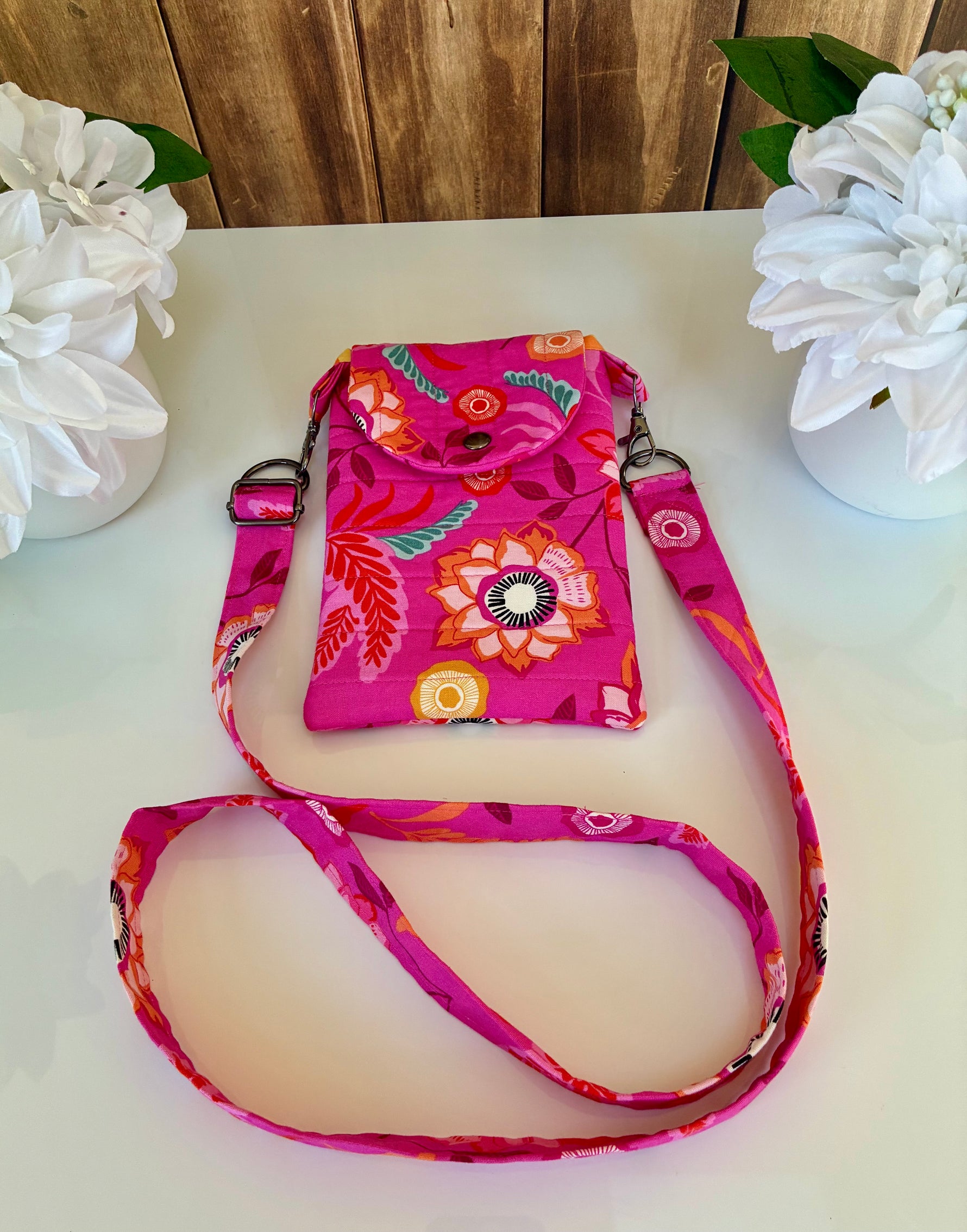 Handmade bright pink quilted crossbody bag detail