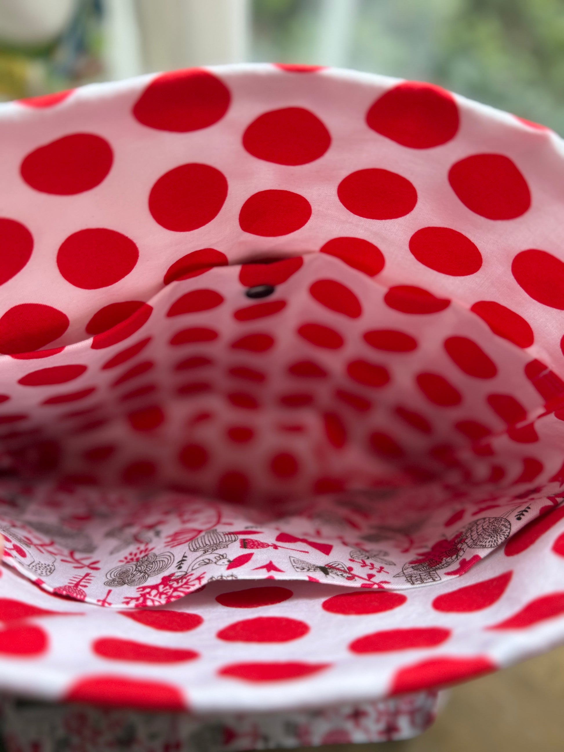 Handmade red white shoulder bag close-up