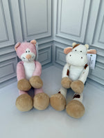 Pink cat plush toy side view