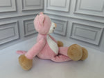 Pink cat plush toy with bow