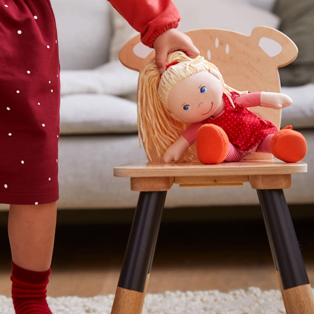 Annelie soft doll sitting by HABA USA