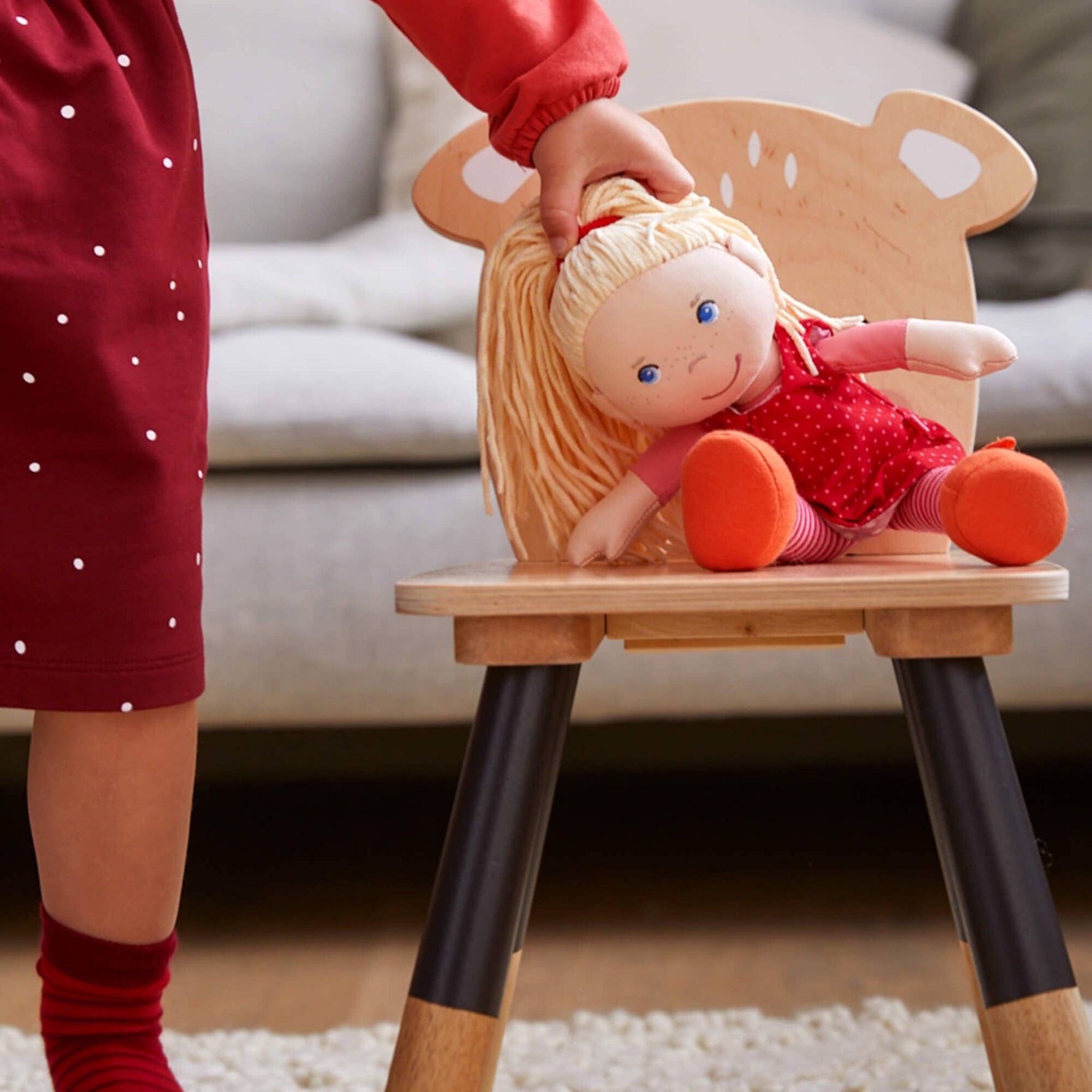 Annelie soft doll sitting by HABA USA