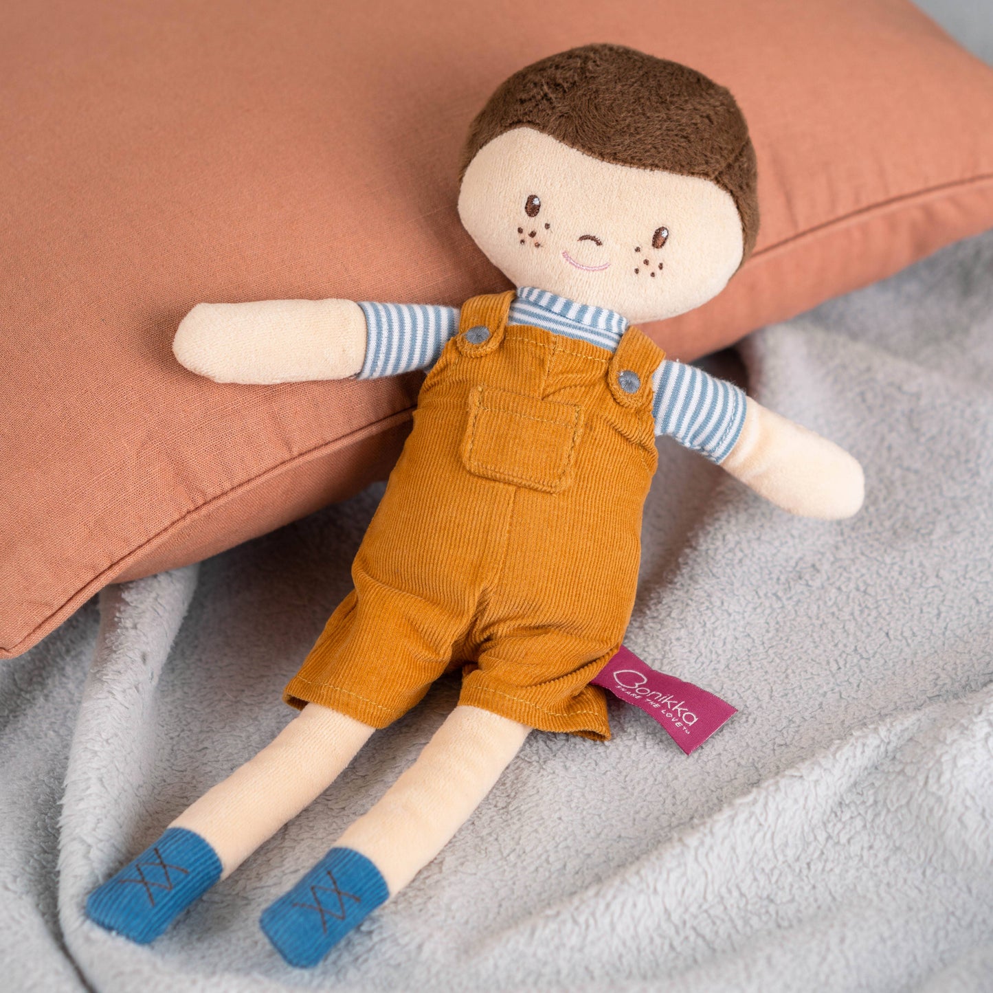 Tim soft doll close-up by Tikiri Toys