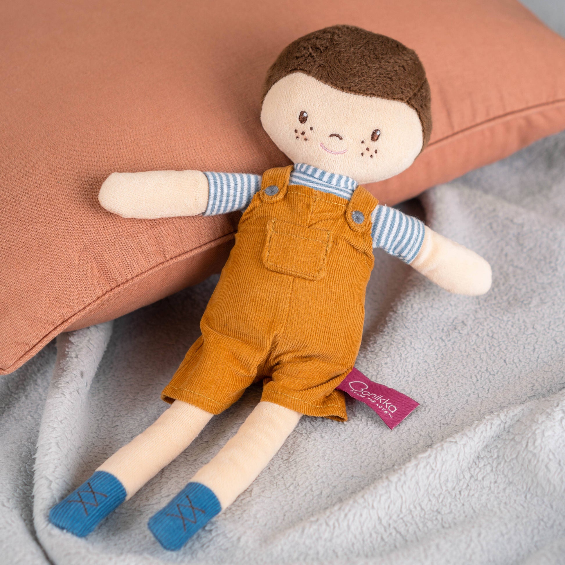 Tim soft doll close-up by Tikiri Toys
