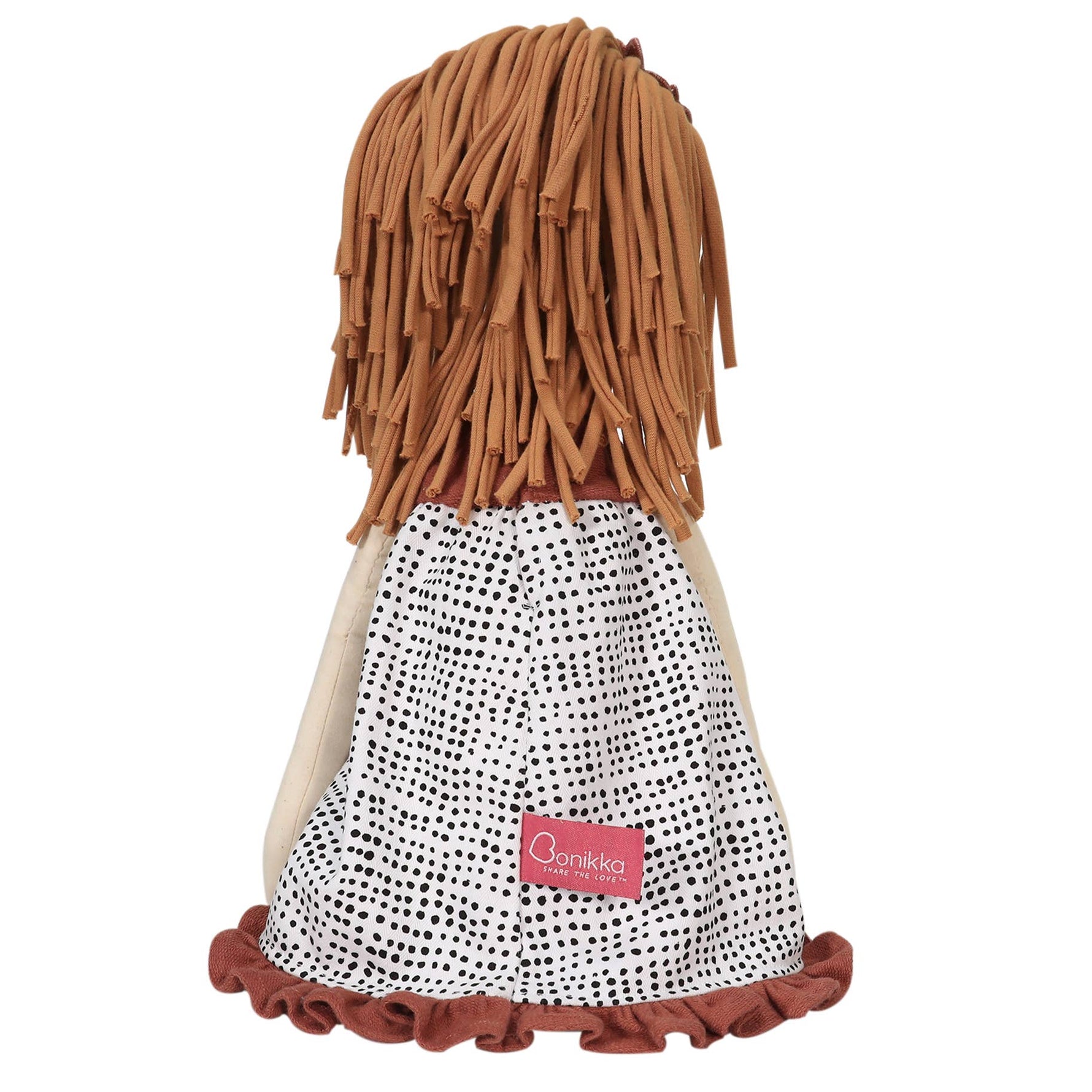 Amber doll sitting by Tikiri Toys