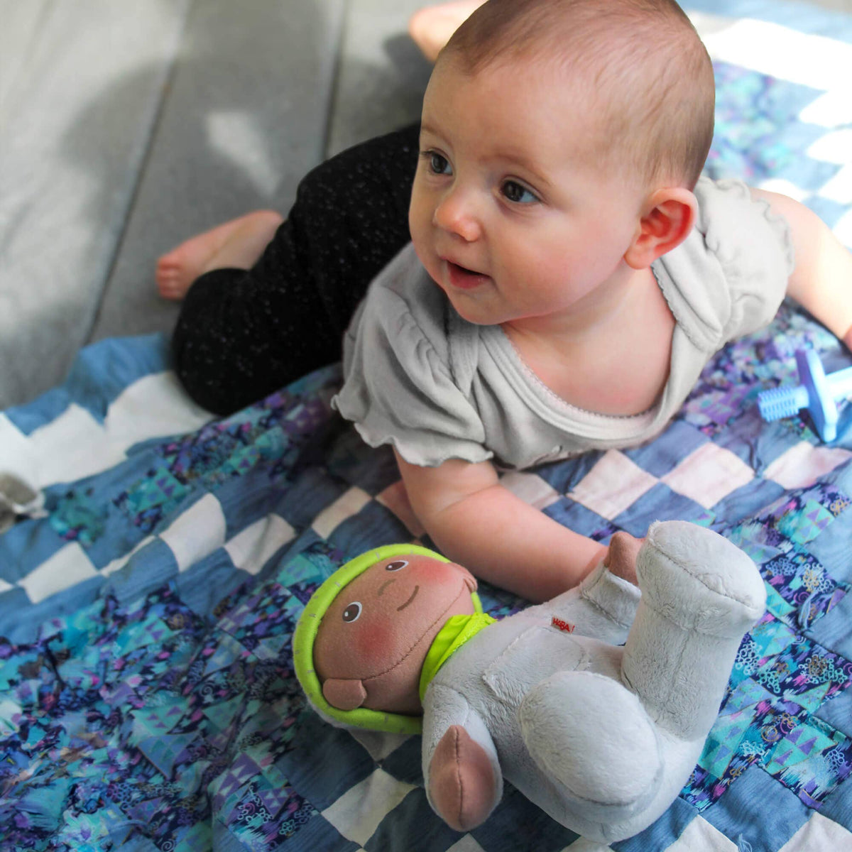My First Snug Up Ollie baby doll close-up by HABA USA