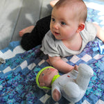 My First Snug Up Ollie baby doll close-up by HABA USA