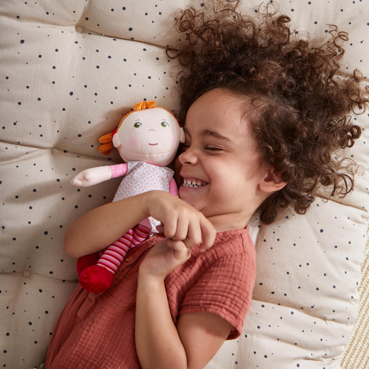 Snug Up Roya soft doll back view by HABA USA