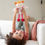 Snug Up Roya soft doll sitting by HABA USA