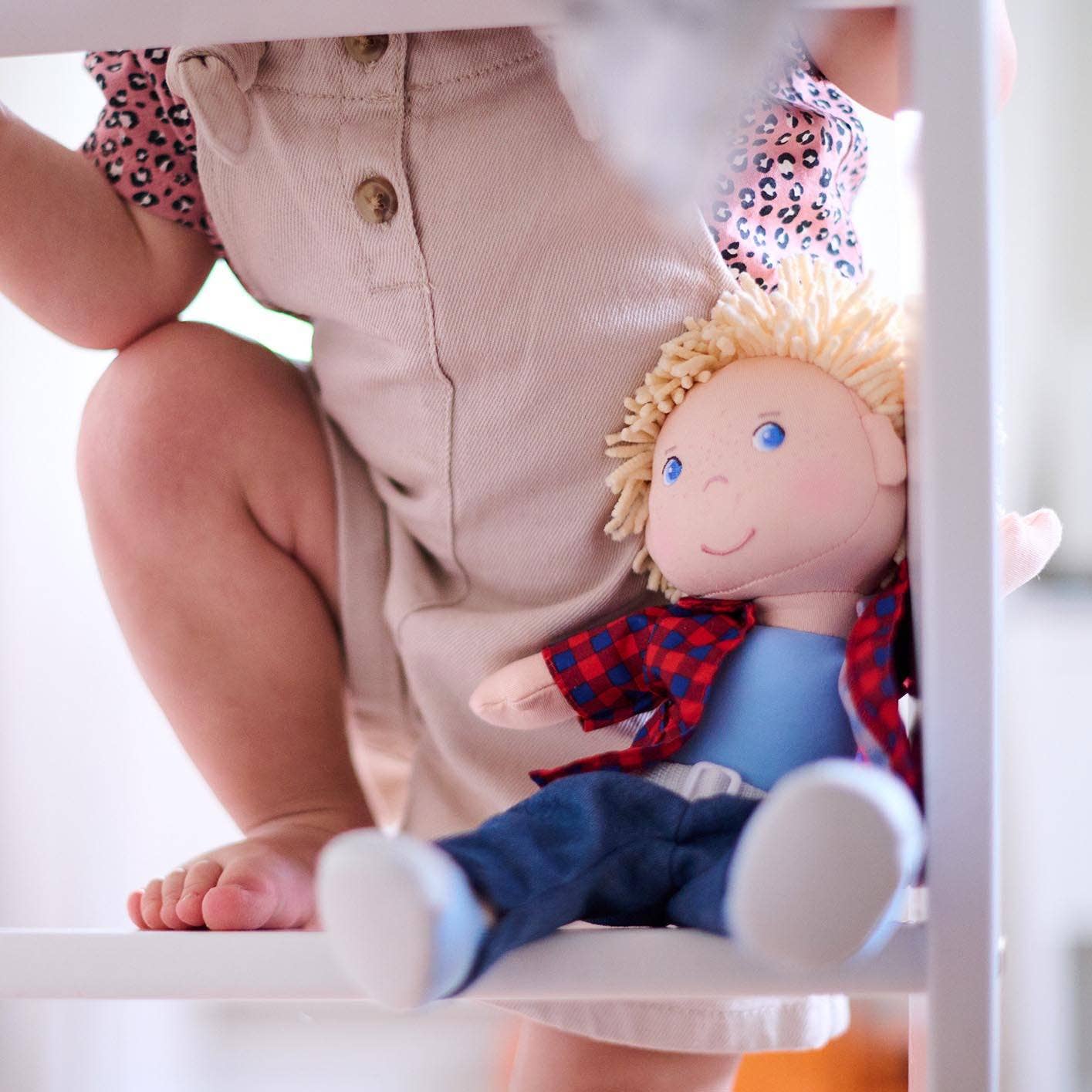 Nick soft doll sitting by HABA USA